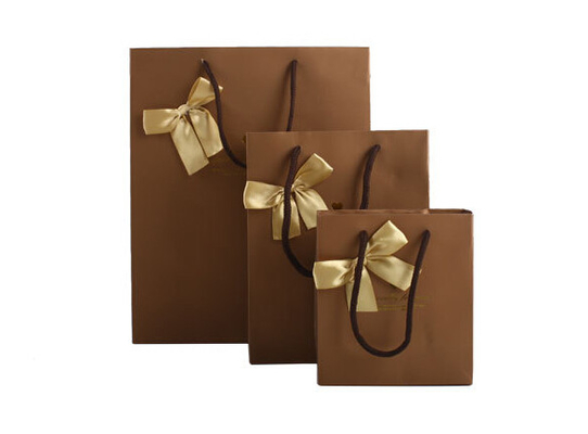 Το προωθητικό δώρο εγγράφου τοποθετεί σε σάκκο/εγγράφου τσάντες Κόμματος με τις λαβές για τη συσκευασία σοκολάτας